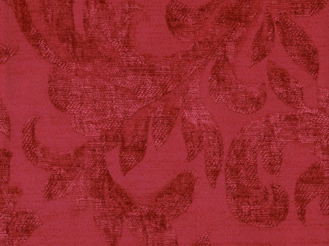 Deep raspberry chenille with darker tonal scrolling leaves and botanical forms