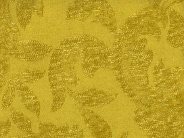 Golden chartreuse chenille with tonal sweeping leaf motifs and a softly woven texture