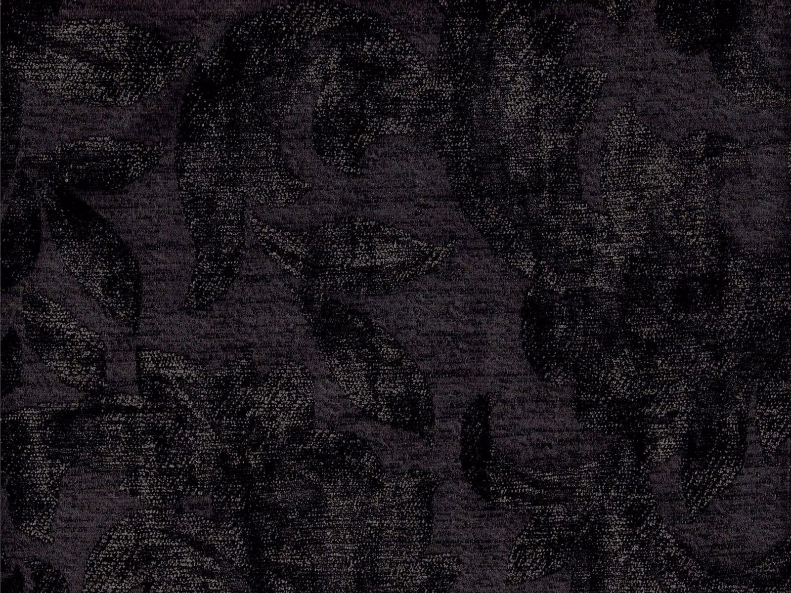 Near-black aubergine chenille with shadowy oversized leaf motifs and a nubby woven surface