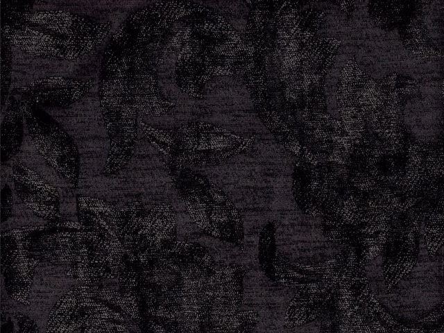 Near-black aubergine chenille with shadowy oversized leaf motifs and a nubby woven surface