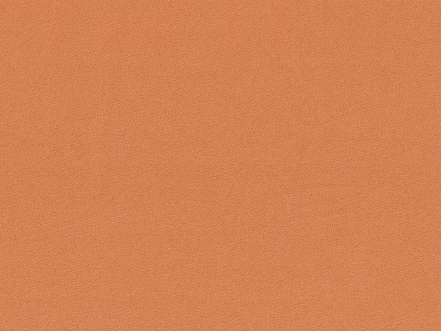 Close-up of muted terracotta chenille with a fine, softly varied woven texture