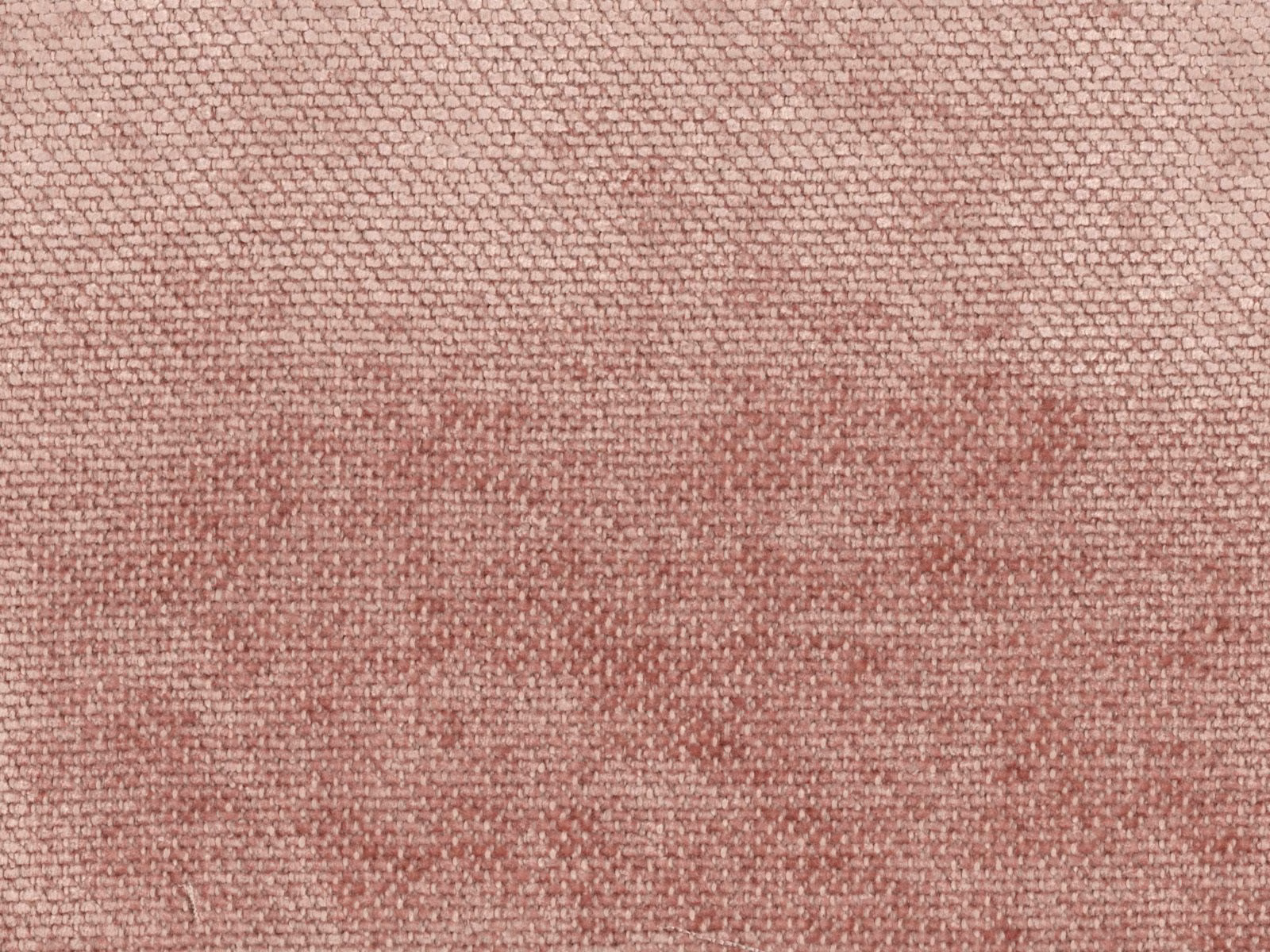 Close-up of dusty rose pink chenille with softly mottled woven texture