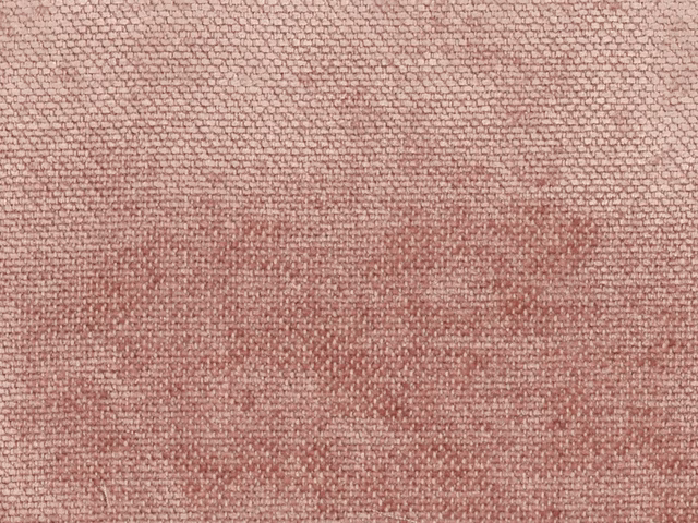 Close-up of dusty rose pink chenille with softly mottled woven texture