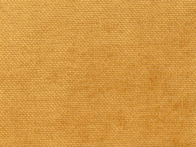 Warm golden ochre chenille with a close, softly pebbled woven texture