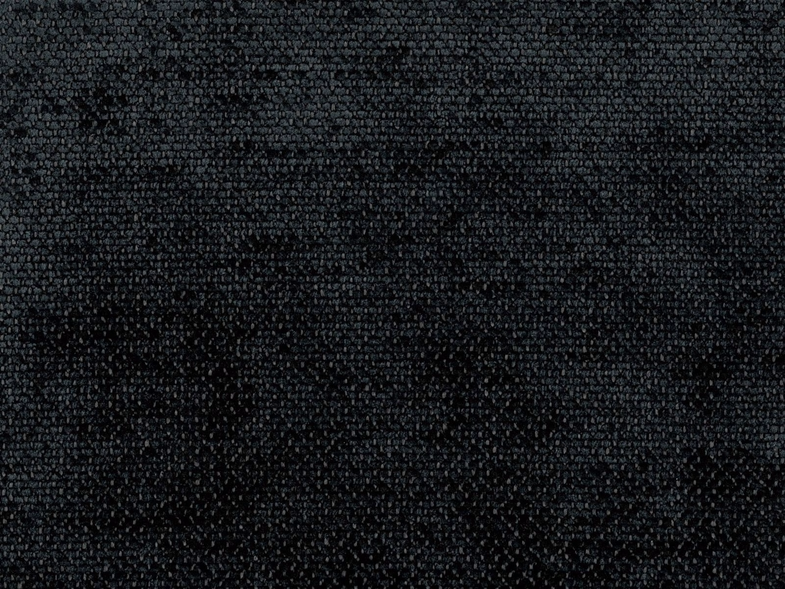 Deep charcoal-black chenille with a close nubby weave and subtle tonal flecks