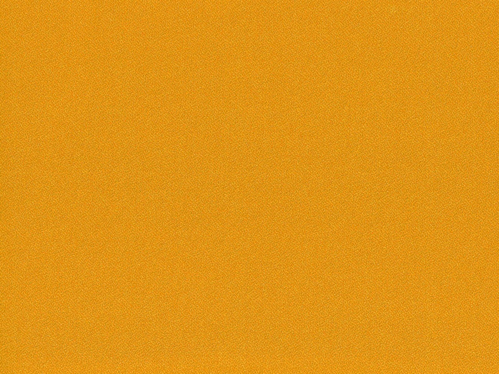 Close-up of warm ochre-gold flat weave with a fine, even woven texture