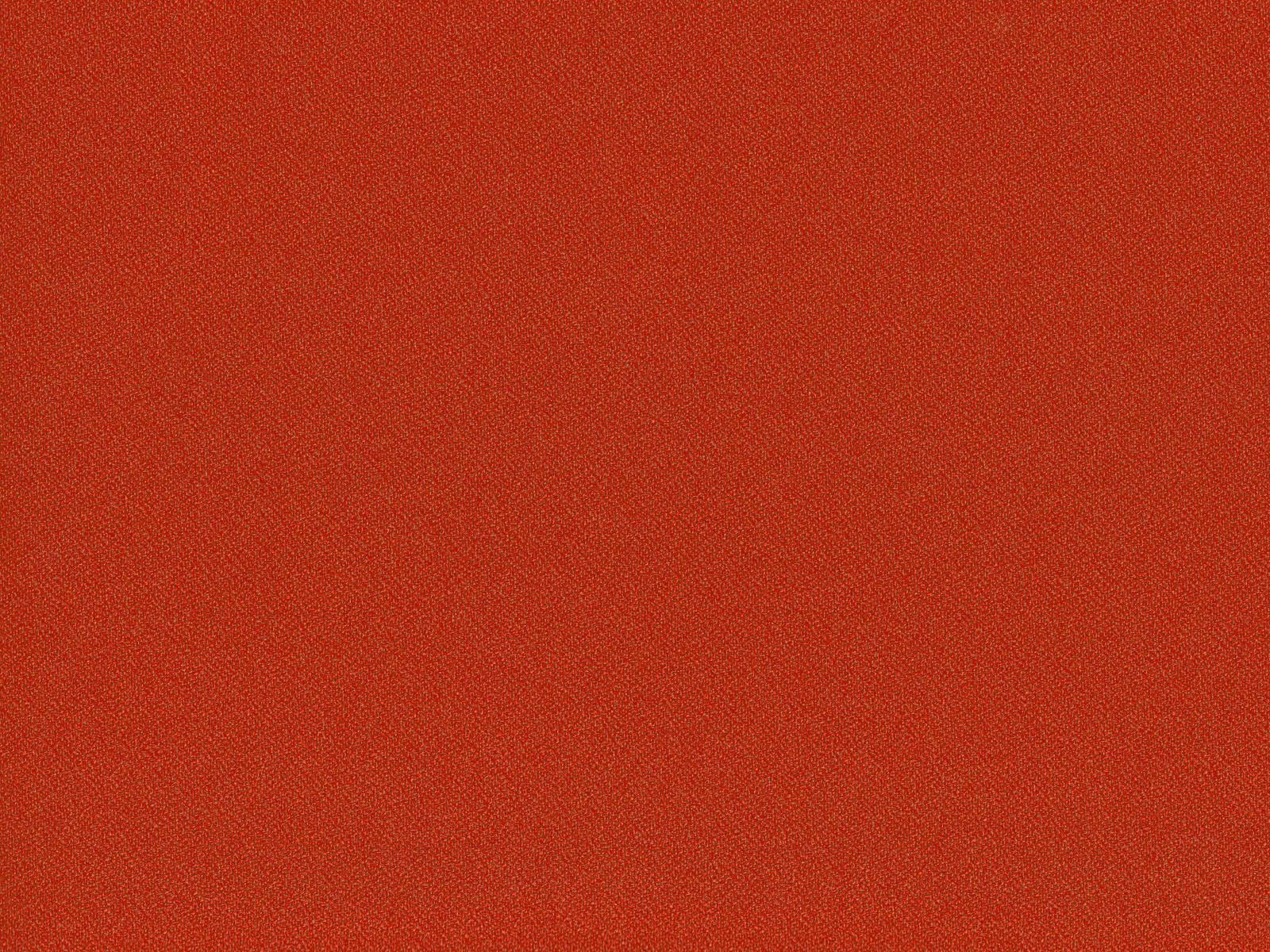 Warm brick-red flat-weave fabric with fine granular woven texture