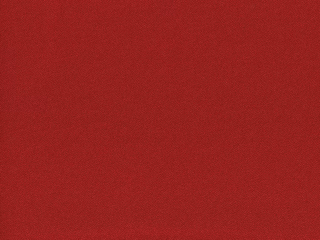Deep crimson-red flat weave showing a fine, even textured surface