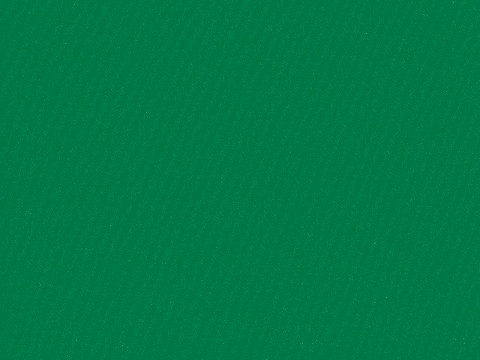 Saturated emerald green flat weave with a fine, softly mottled textile texture