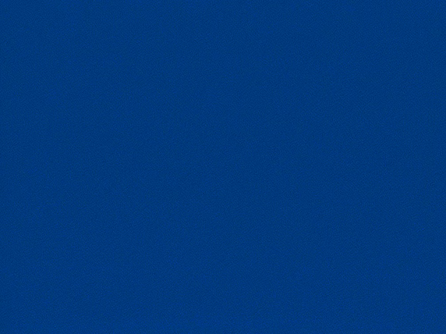 Close view of deep cobalt-blue flat weave with a fine, even grain