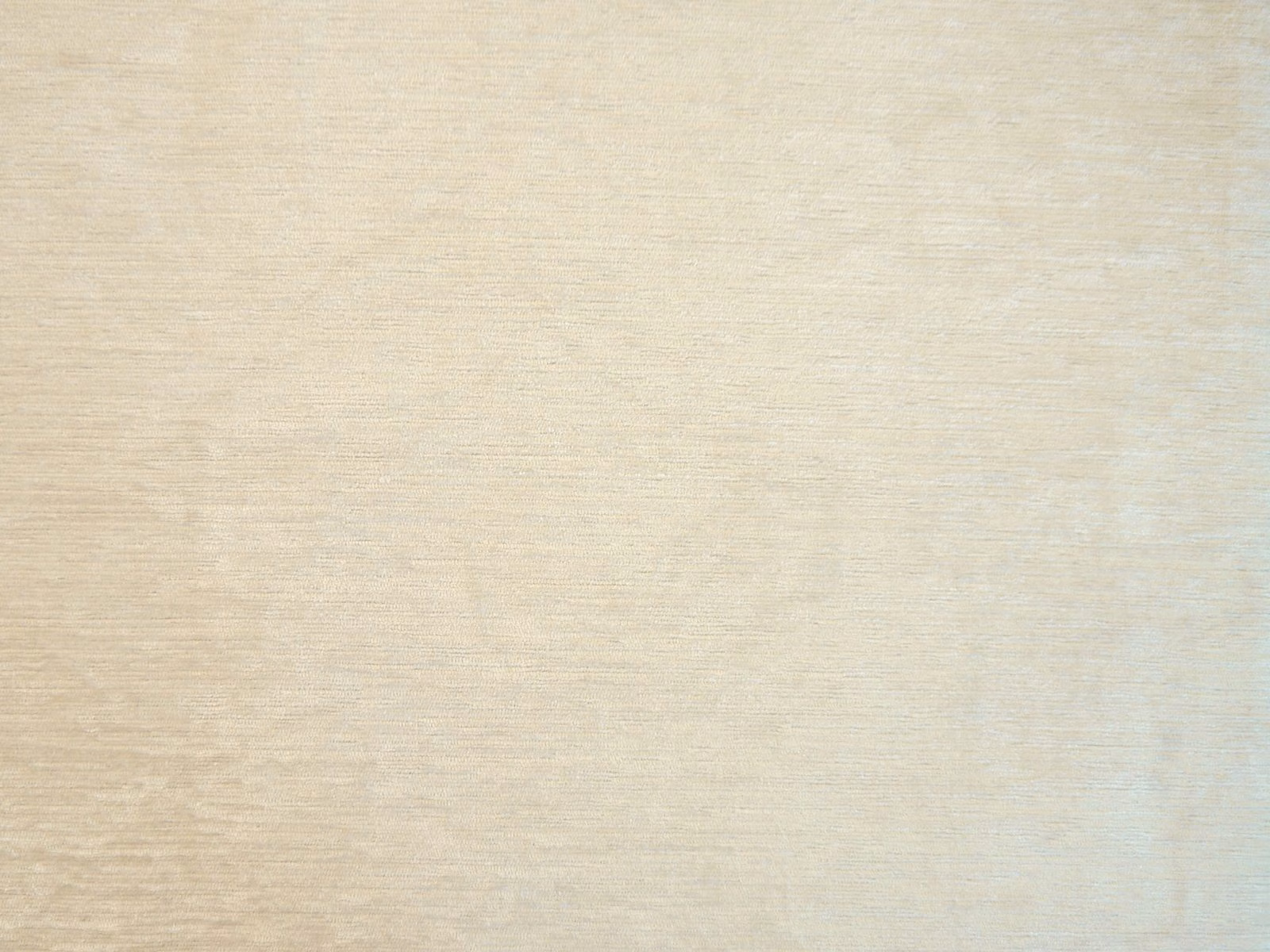 Pale cream-beige chenille swatch with fine horizontal texture and softly brushed surface