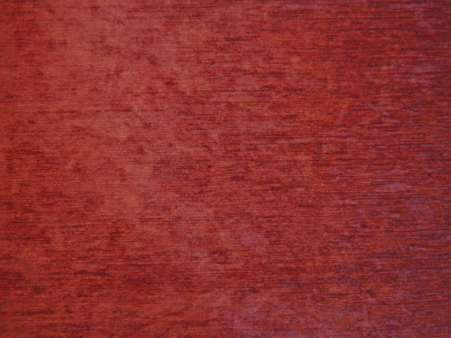 Deep garnet-red chenille with subtle dark horizontal striations and a softly brushed texture