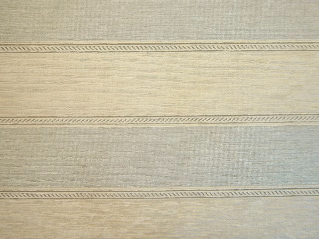 Muted sage-grey chenille with oat horizontal stripes and narrow chevron bands