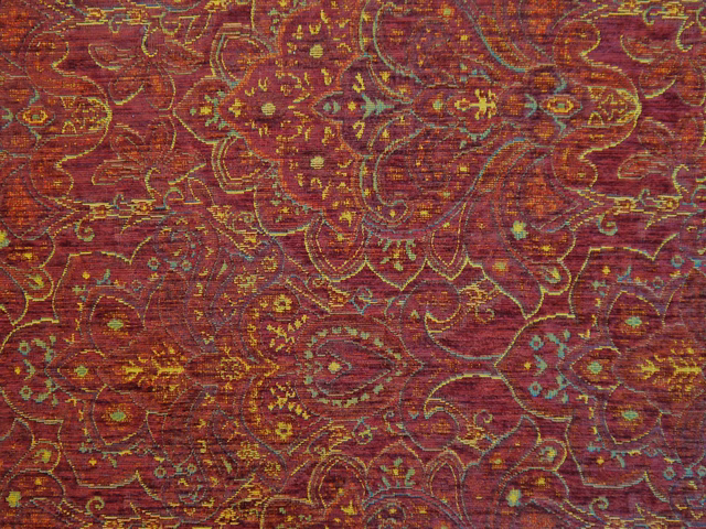 Burgundy chenille with ornate gold paisley, floral tracery and teal accents