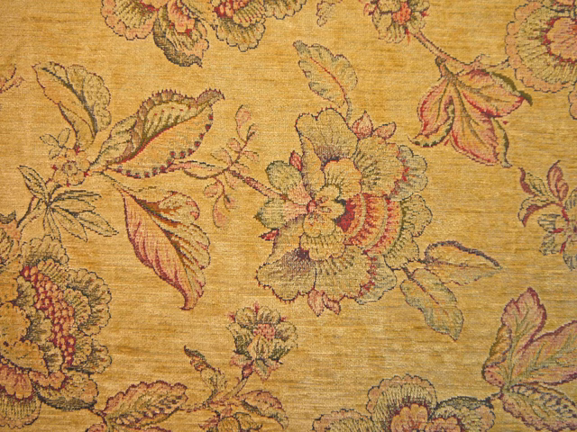 Antique mustard-gold chenille with muted floral blooms, curling leaves and woven horizontal texture