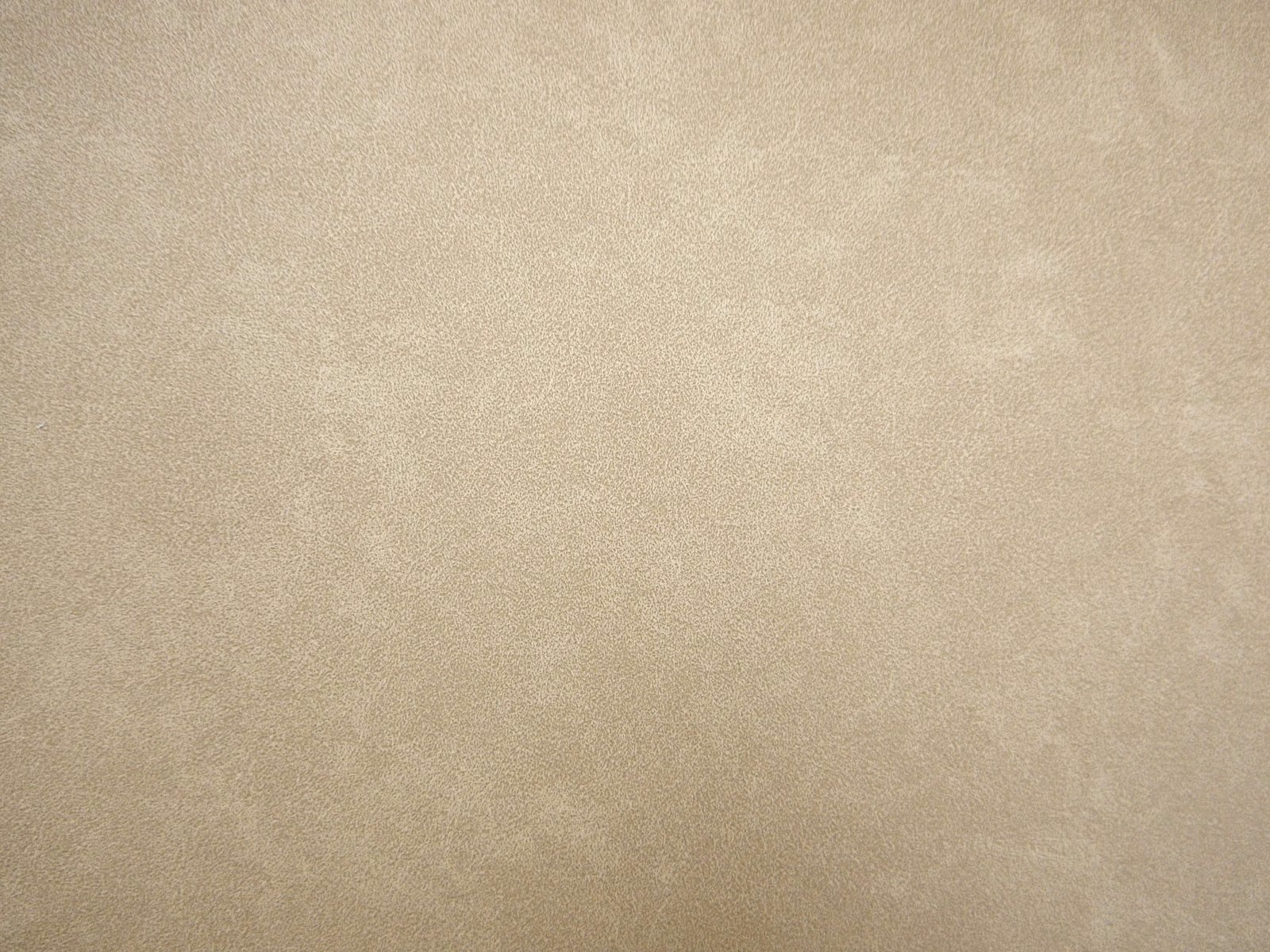 Soft taupe-beige faux leather with subtle cloudy tonal mottling and fine grain