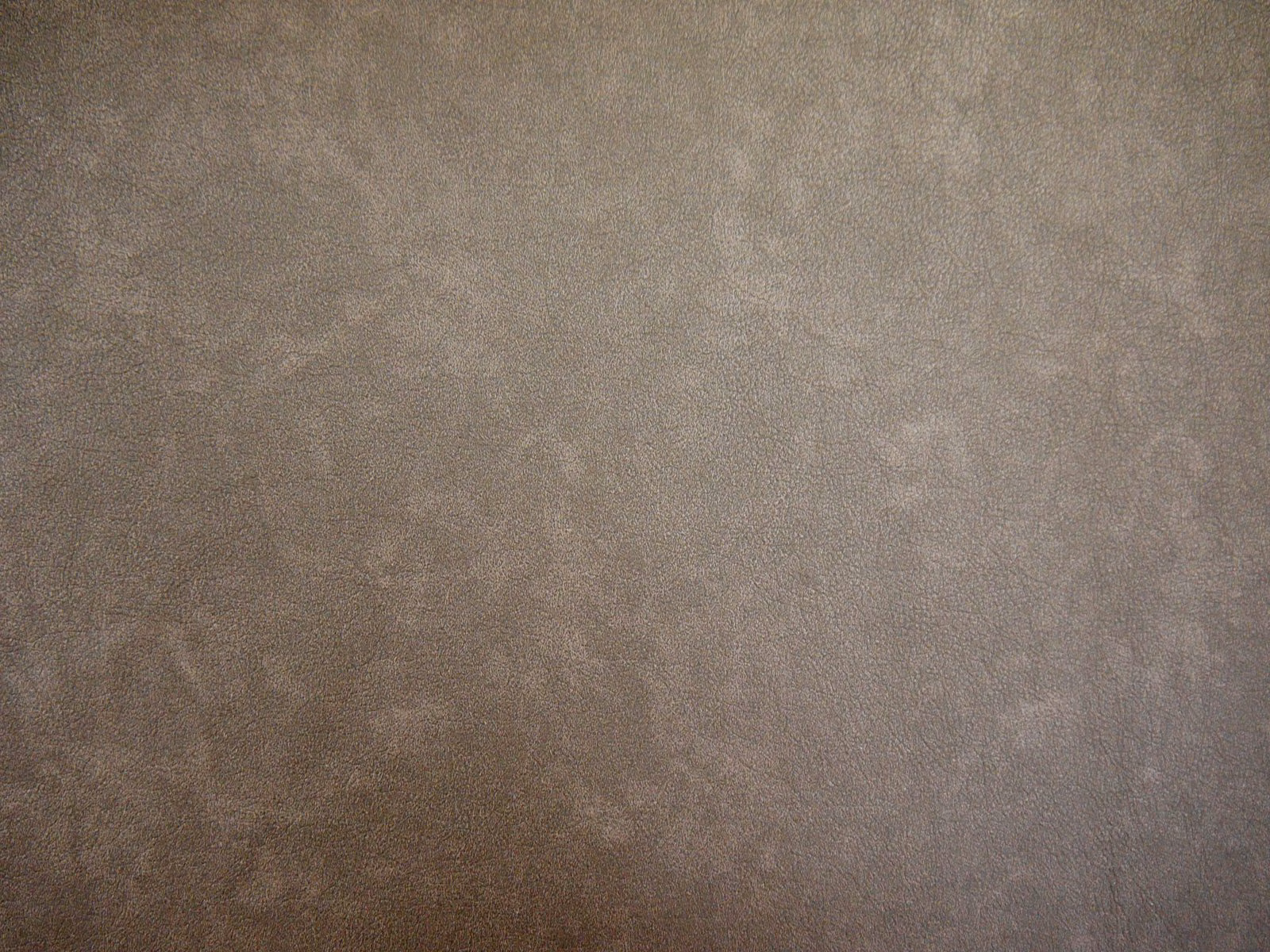 Mottled taupe-grey faux leather with softly cloudy tonal surface variation