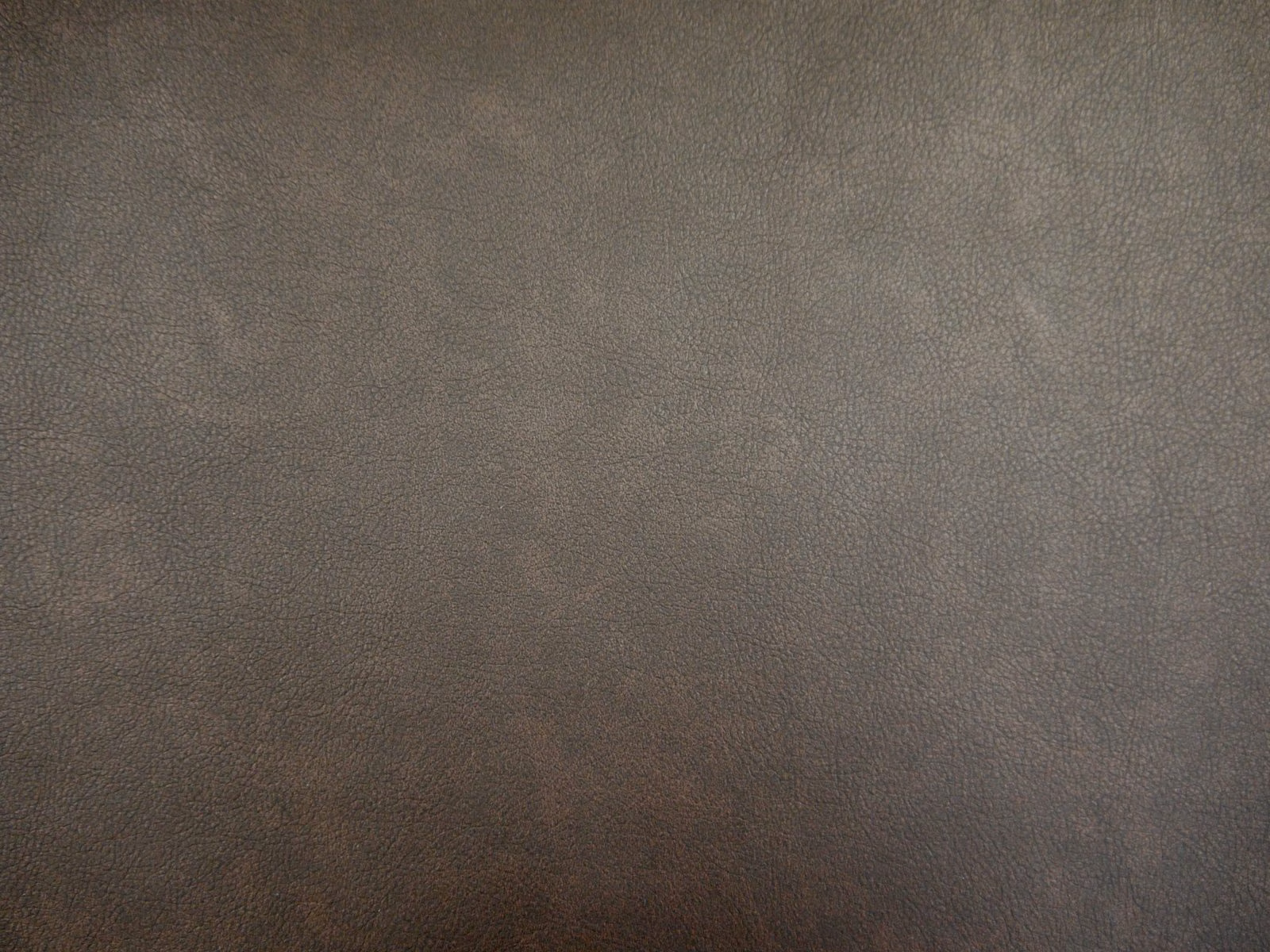Smoky taupe-grey faux leather with fine pebbled grain and softly mottled shading