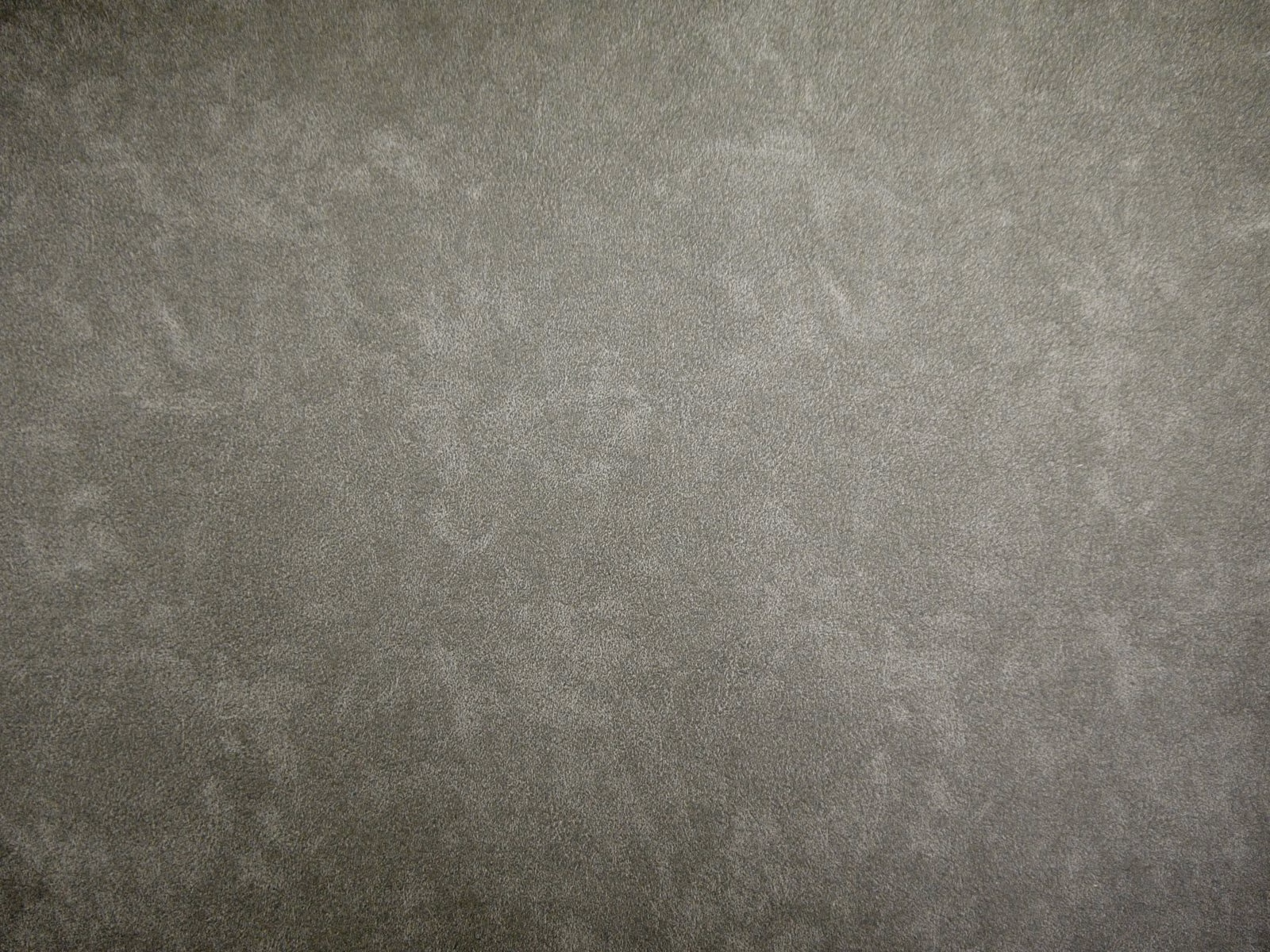 Softly mottled grey-taupe faux leather with a cloudy matte surface