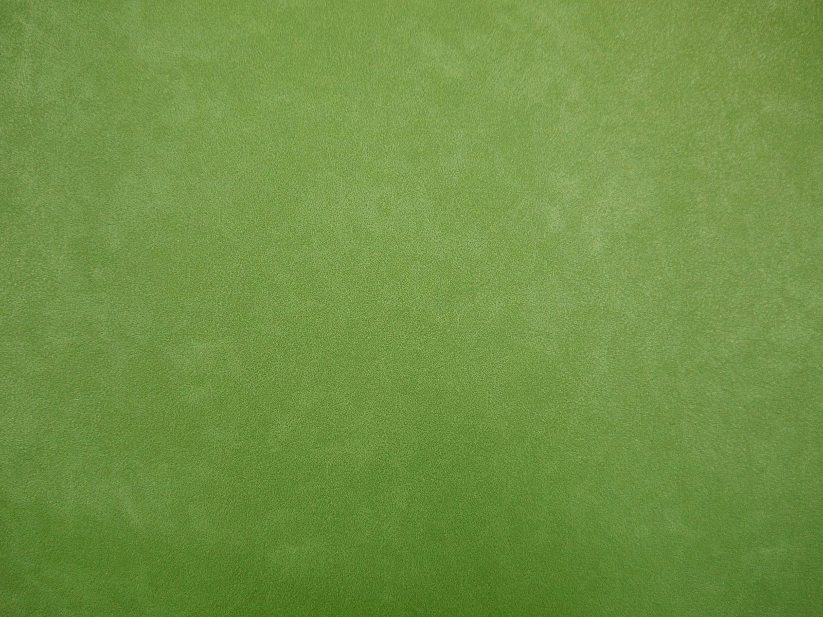 Fresh moss-green faux leather with softly mottled tonal texture