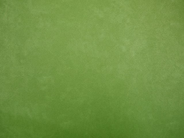 Fresh moss-green faux leather with softly mottled tonal texture