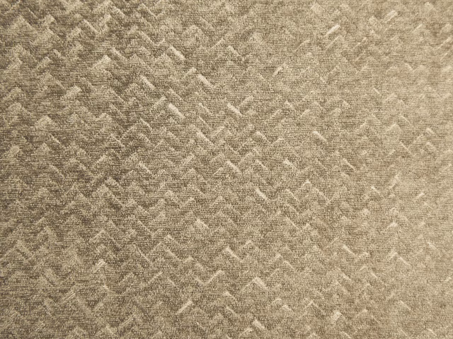 Warm taupe beige chenille with a tactile broken zigzag weave