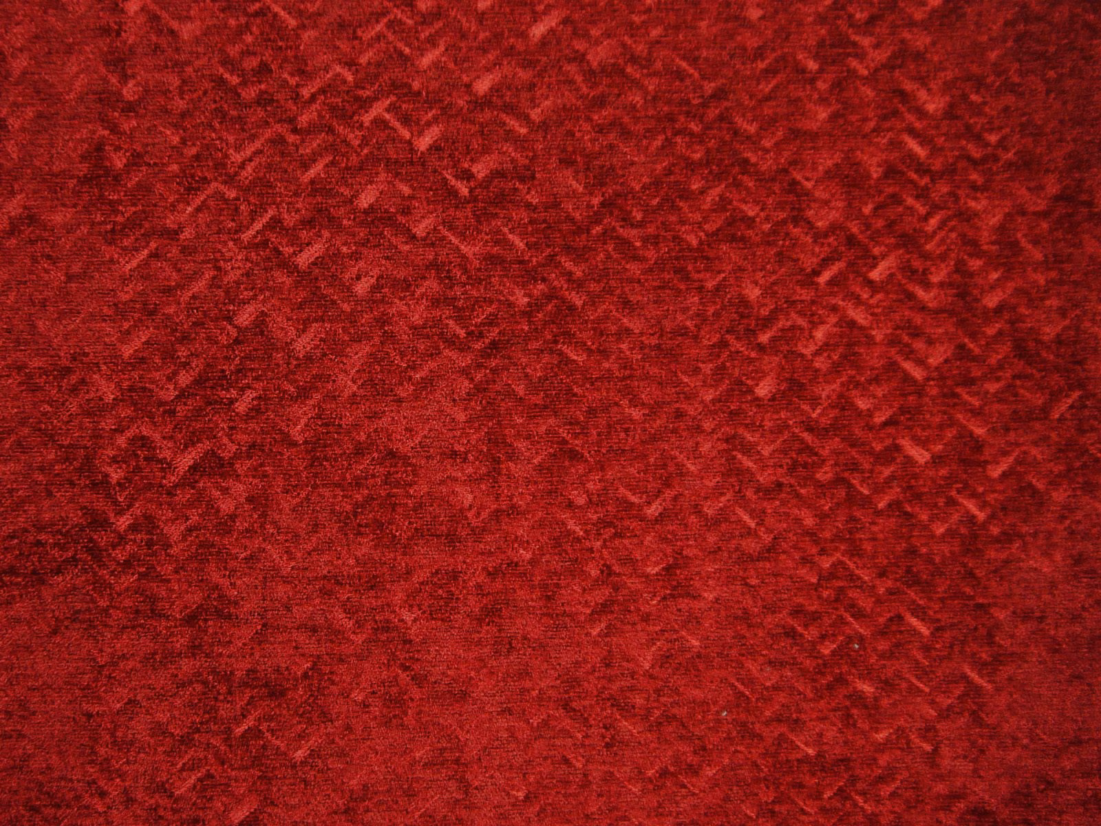 Deep crimson chenille with plush pile and subtle broken zigzag texture