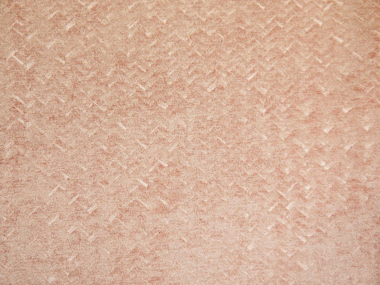 Dusty blush-pink chenille with scattered pale abstract flecks and a softly brushed texture