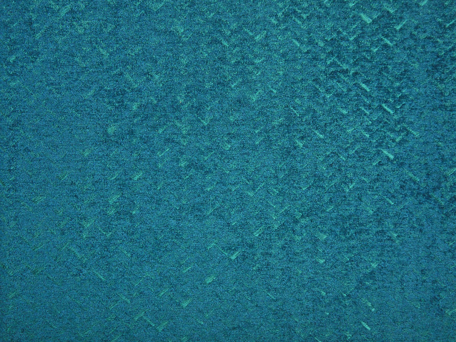 Deep blue-teal chenille with mottled turquoise flecks and softly brushed texture