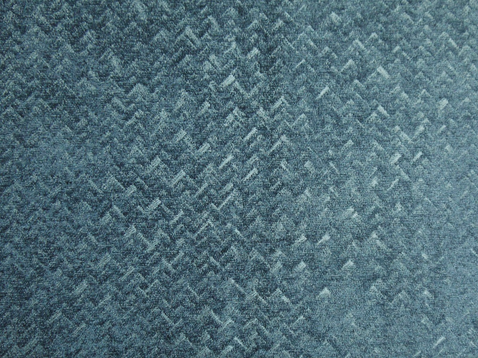 Muted blue-teal chenille with a mottled broken zigzag weave and pale highlights
