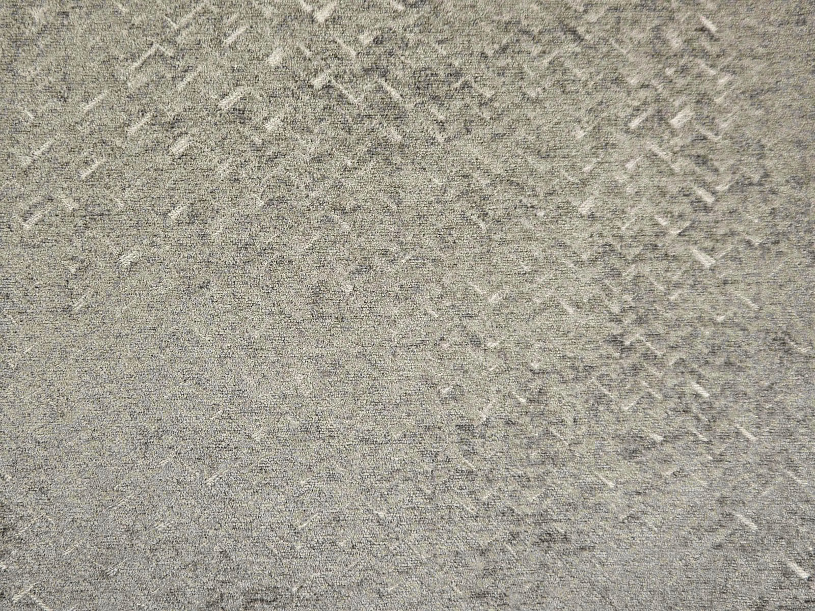 Mottled stone-grey chenille with fine pale diagonal flecks and softly raised texture