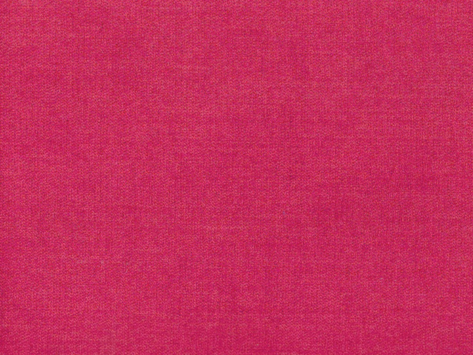 Close-up of vivid raspberry pink chenille with a subtly mottled woven texture