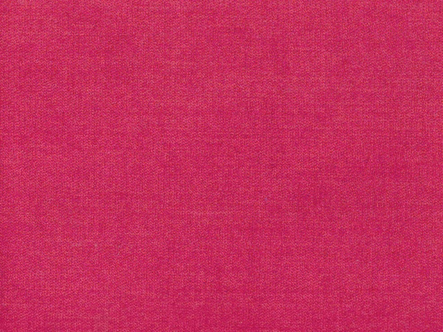 Close-up of vivid raspberry pink chenille with a subtly mottled woven texture