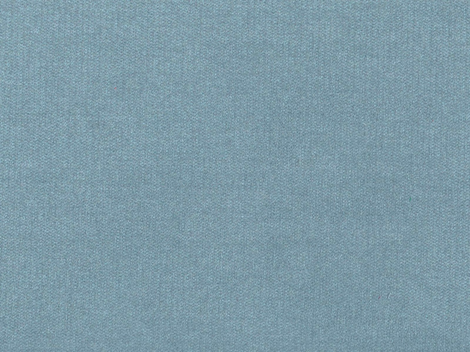 Close-up of muted aqua-blue chenille with a fine, gently mottled woven surface