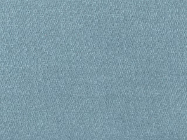 Close-up of muted aqua-blue chenille with a fine, gently mottled woven surface