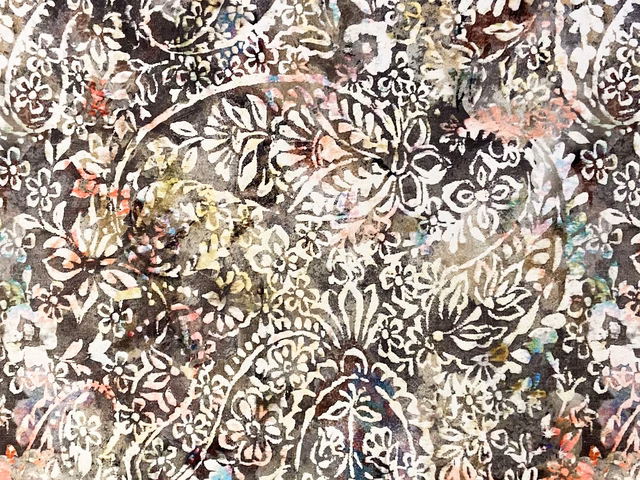 Dense charcoal floral velvet with ivory, blush, olive and teal painterly accents
