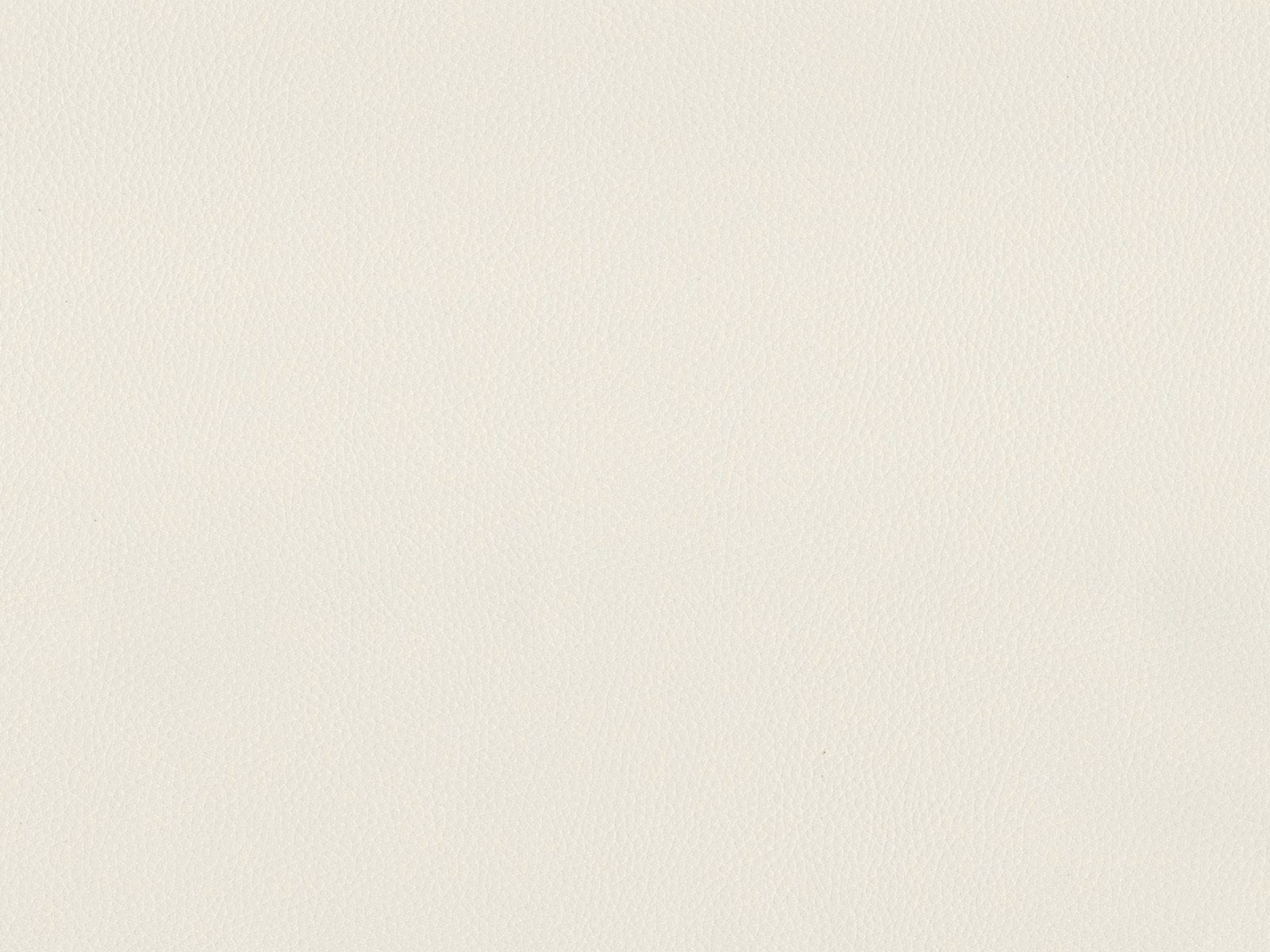 Close-up of softly ivory faux leather with a fine, pebbled grain