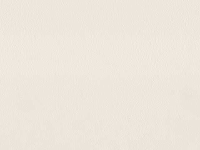 Close-up of softly ivory faux leather with a fine, pebbled grain