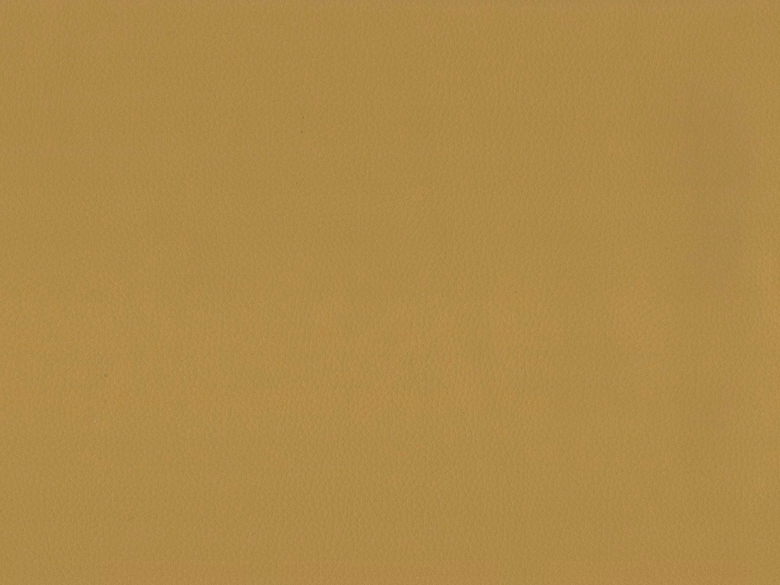 Warm ochre gold faux leather swatch with a subtle fine-grain surface