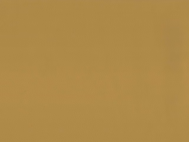 Warm ochre gold faux leather swatch with a subtle fine-grain surface