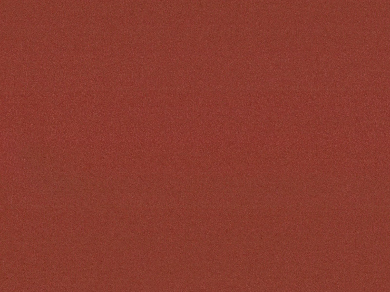 Deep muted red faux leather with a fine, low-sheen grain texture
