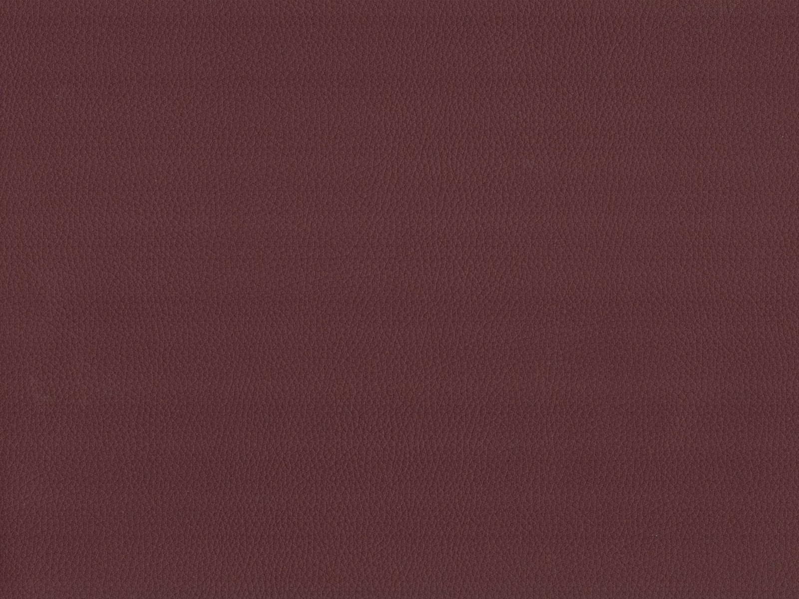 Deep burgundy faux leather with a subtle, fine pebbled grain