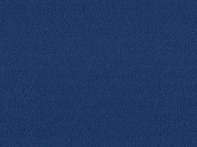 Deep navy faux leather swatch with fine pebbled grain and subtle tonal variation