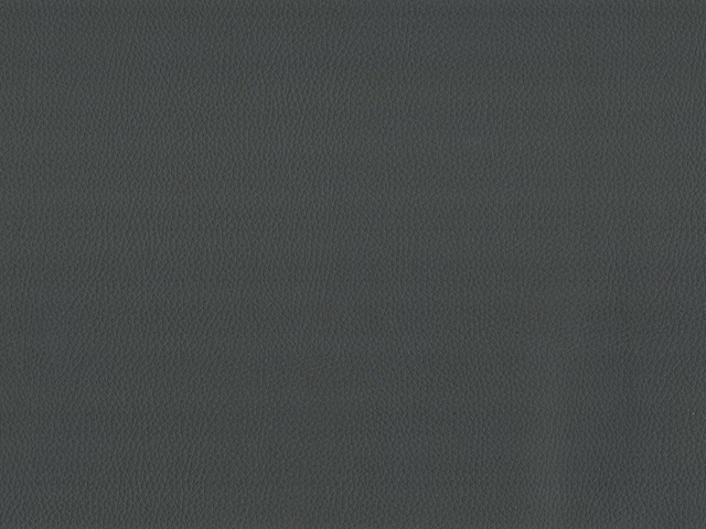 Close-up of charcoal grey faux leather with a fine pebbled grain and low sheen
