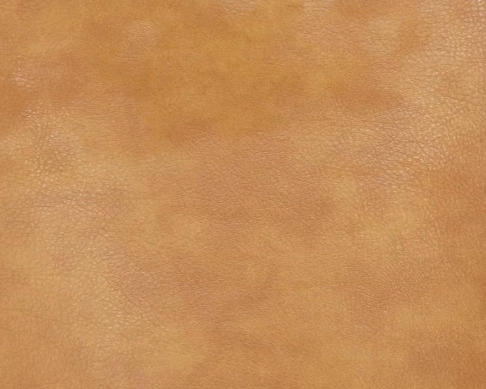 Warm caramel faux leather with subtle mottling and fine pebbled grain