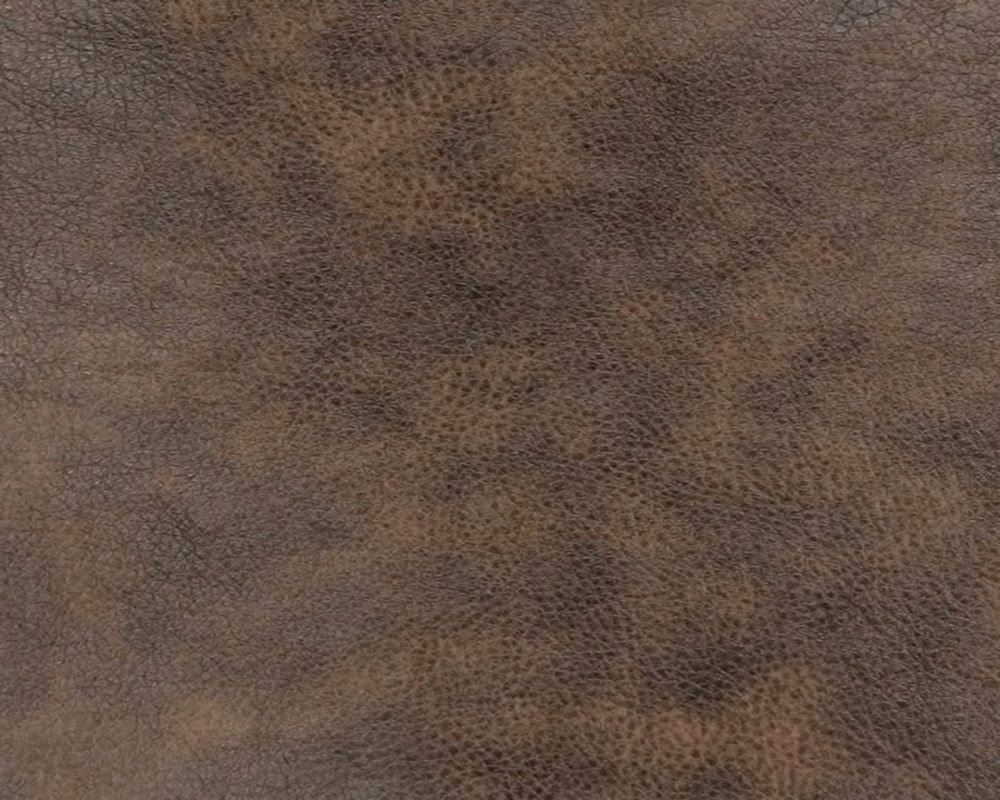 Mottled cocoa-brown faux leather with fine pebbled grain and charcoal shading