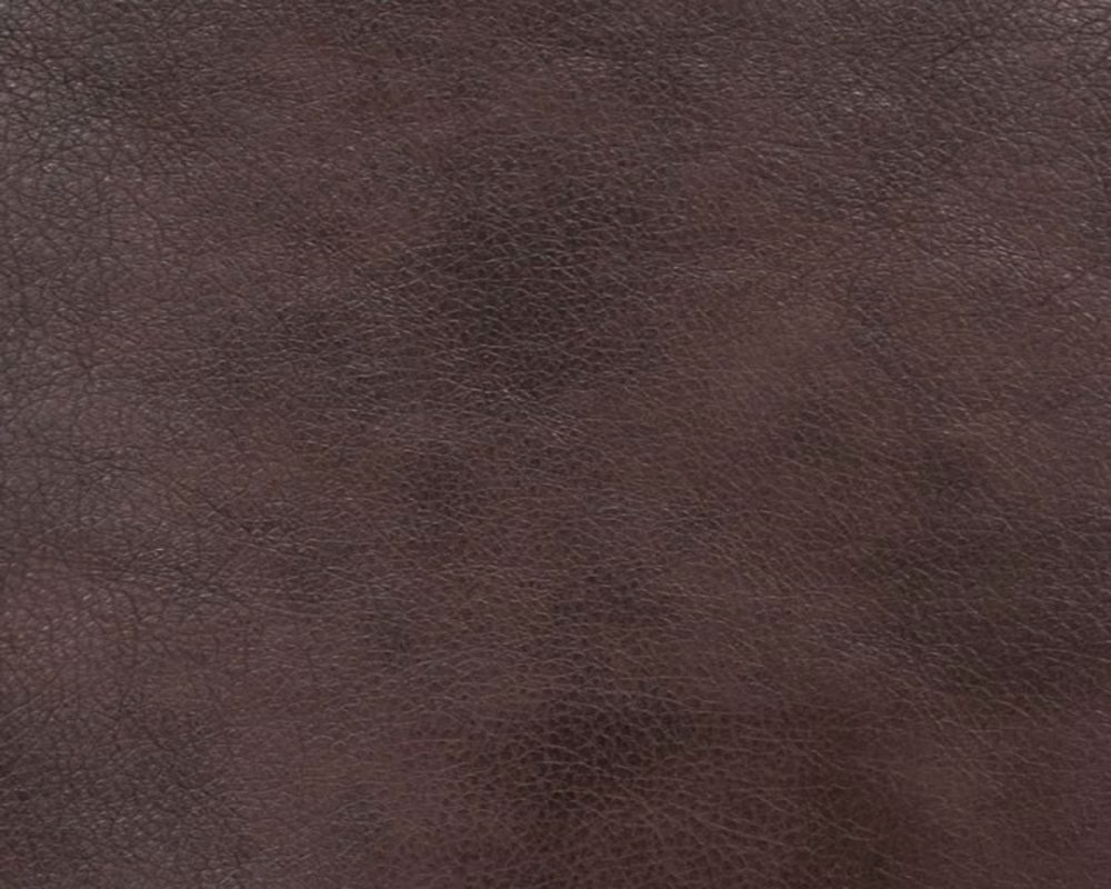 Dark chocolate-brown faux leather showing a fine, softly pebbled grain