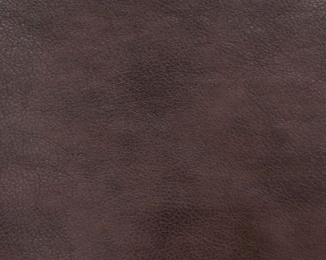 Dark chocolate-brown faux leather showing a fine, softly pebbled grain