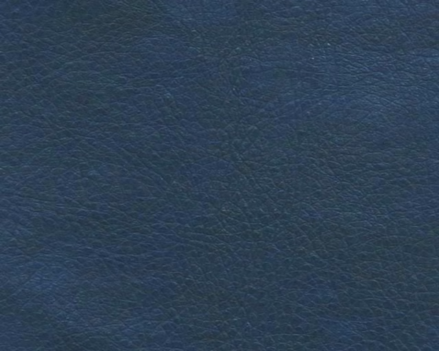 Deep petrol-blue faux leather with a fine, organic pebbled grain
