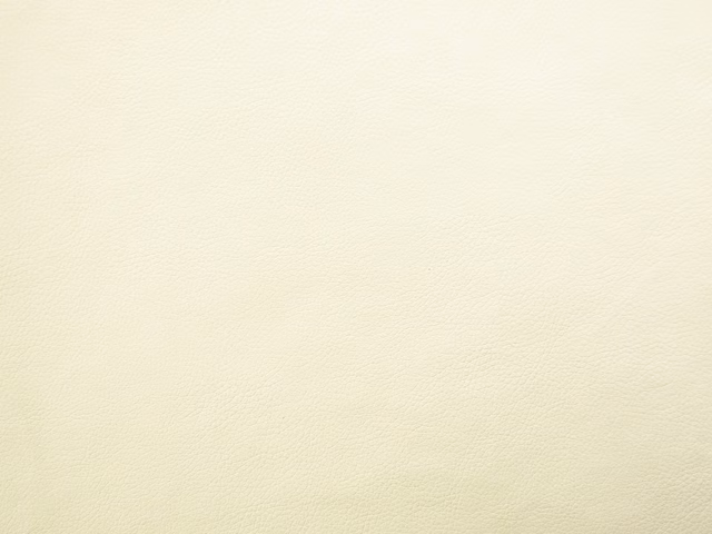 Pale warm cream faux leather with a fine, softly pebbled grain